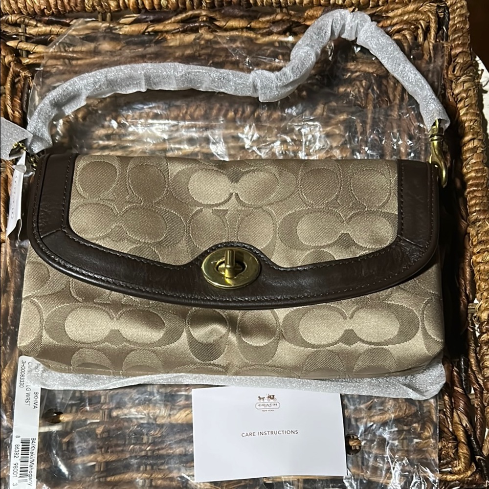Coach Brown and Tan Monogram Large Wristlet BNWT